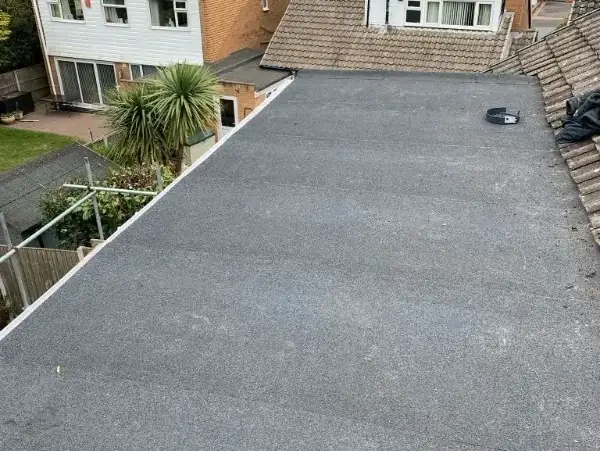 New torch-on felt flat roof running along a home in Sutton Coldfield