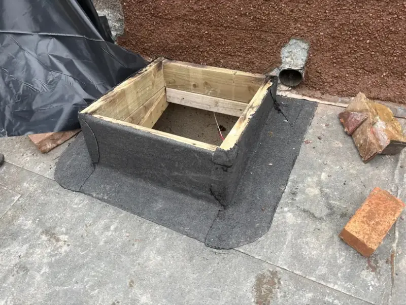 New felted timber upstand on a flat roof during urgent work in Yardley Wood